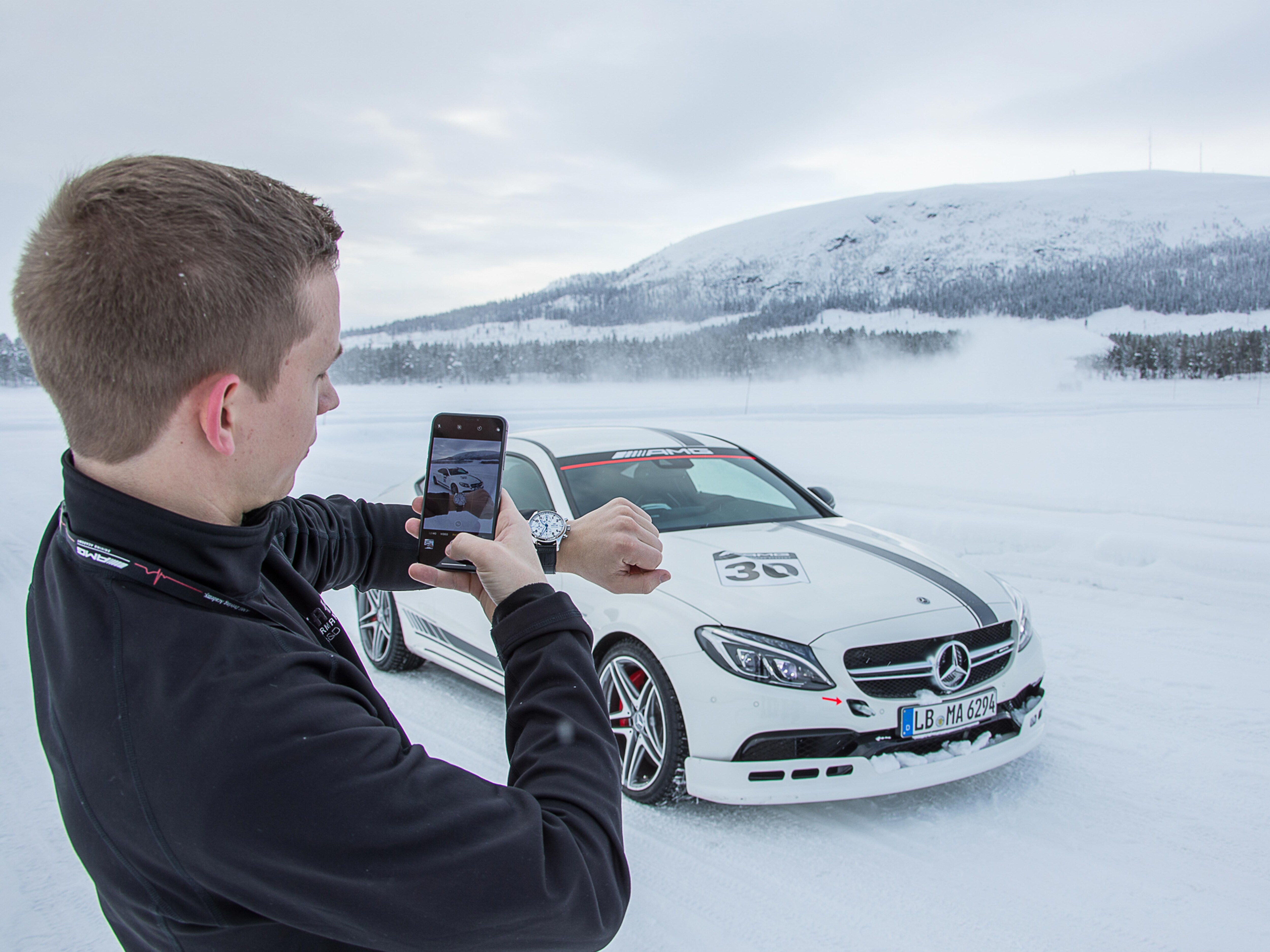 Wristshot with the Mercedes AMG C63 and the IWC Pilot’s Watch Chronograph Edition “150 Years”