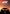 F1: THE MOVIE poster with racing car and sunset background.