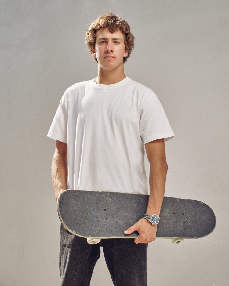 Jagger Eaton holding his skateboard