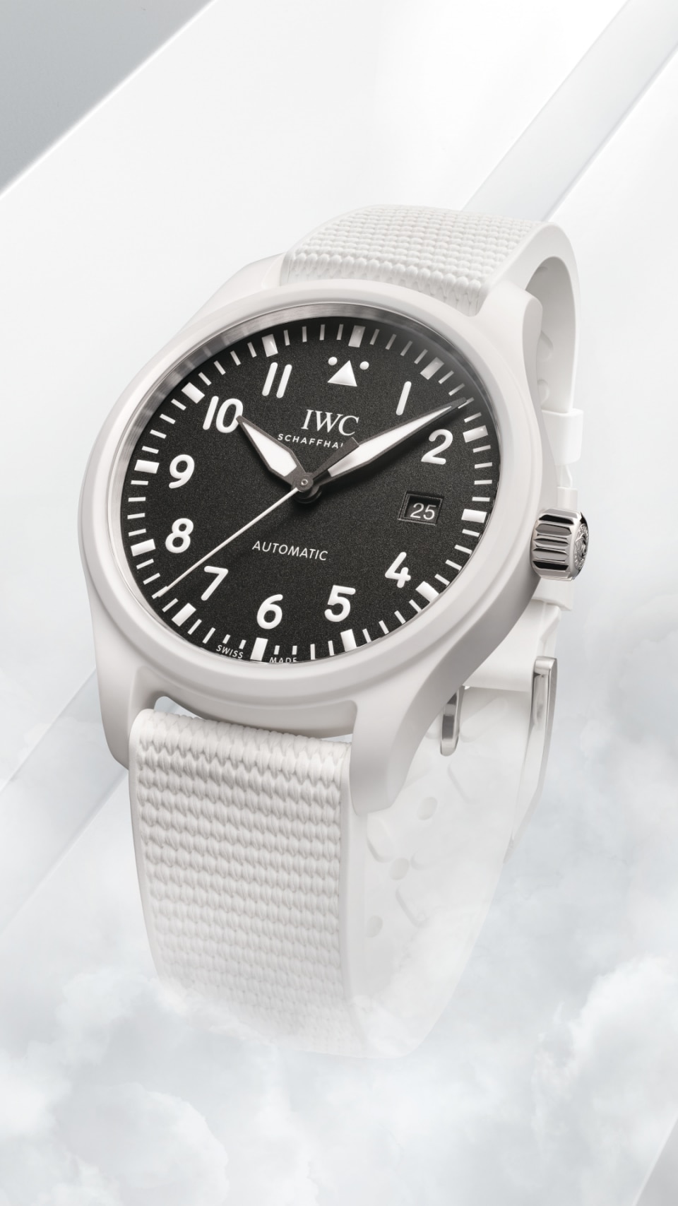 Pilot's Watch Automatic 41 TOP GUN Lake Tahoe with black dial, white ceramic case and white rubber strap on a white cloudy background.