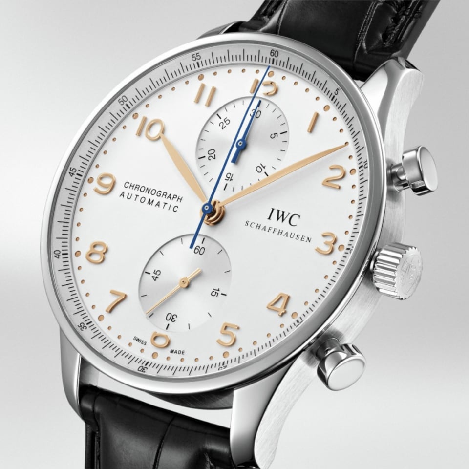 Close up of IWC Portugieser Chronograph IW371445 with silver dial, stainless steel case and black leather strap